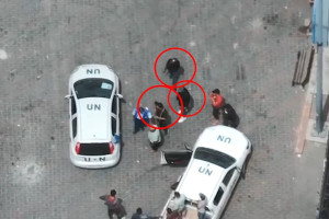 Hamas terrorists armed with guns seen inside a UNRWA logistic center for humanitarian purposes in Gaza, on Saturday May 11, 2024 (Photo: IDF).