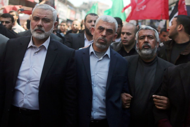Hamas Gaza Chief Yehya Al-Sinwar (C) and Hamas leader Ismail Haniyeh (L) in Gaza City March 25, 2017. (Photo: Mohammed Salem/REUTERS)