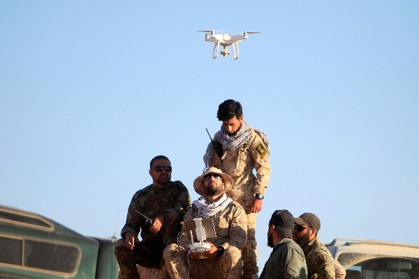 Hezbollah fighters fly a drone at Juroud Arsal, the Syria-Lebanon border, July 29, 2017 (Photo: REUTERS/Ali Hashisho).
