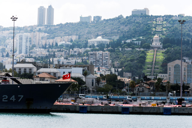 A Turkish naval frigate is seen berthed at the Haifa Port, with the Baha'i Gardens in the background, in Haifa, Israel September 4, 2022. REUTERS/ Amir Cohen