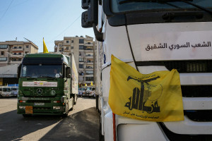 A Hezbollah flag seen on a truck loaded with supplies at a parking lot in Beirut's southern suburb, a stronghold of Hezbollah, in 2023. Iran often uses trucks to transfer weapons to Hezbollah. (Photo: DPA / Picture Alliance / Via Reuters).