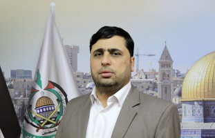 The media spokesman for Hamas, Abd al-Latif al-Qanou speaks during an interview with APA agency. IMAGO/APAimages via Reuters Connect