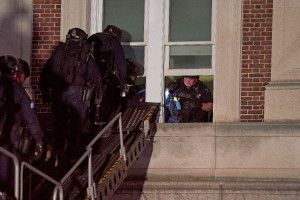 Police use a special vehicle to enter Hamilton Hall which protesters occupied, as other officers enter the campus of Columbia University, during the ongoing conflict between Israel and the Palestinian Islamist group Hamas, in New York City, U.S., April 30, 2024 (Photo: REUTERS/David Dee Delgado).