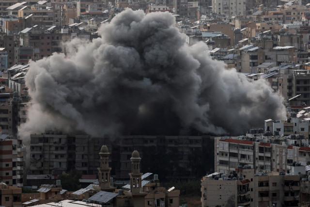 Smoke billows over Beirut's southern suburbs after an Israeli strike, amid the ongoing hostilities between Hezbollah and Israeli forces, as seen from Baabda, Lebanon, November 24, 2024. REUTERS/Mohamed Azakir