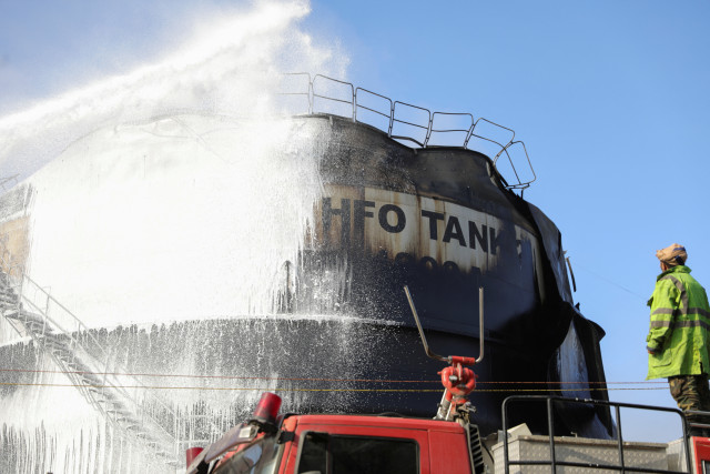 A firefighter works to extinguish a fire at a power station following Israeli airstrikes in Sanaa, Yemen December 19, 2024. REUTERS/Khaled Abdullah