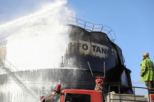 A firefighter works to extinguish a fire at a power station following Israeli airstrikes in Sanaa, Yemen December 19, 2024. REUTERS/Khaled Abdullah