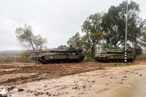 Israeli tanks are seen on a road following the ceasefire between Israel and the Iran-backed group Hezbollah, near the Israel-Lebanon border in northern Israel, December 29, 2024. REUTERS/Avi Ohayon