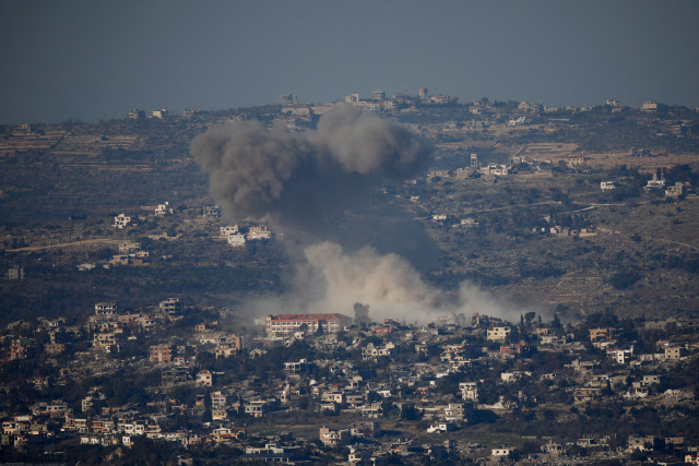 Smoke rise after an explosion in southern Lebanon, as seen from northern Israel, January 13, 2025. REUTERS/Shir Torem
