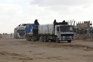 Trucks carrying humanitarian aid and fuel continue to enter the region through the Kerm Abu Salim border crossing in Rafah, Gaza on February 13, 2025. Photo by Ali Hamad/Reuters