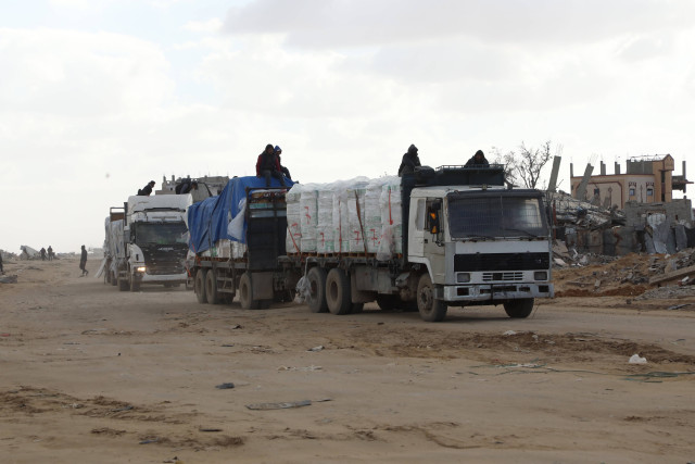 Trucks carrying humanitarian aid and fuel continue to enter the region through the Kerm Abu Salim border crossing in Rafah, Gaza on February 13, 2025. Photo by Ali Hamad/Reuters