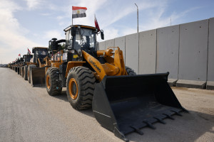 Loaders are lined up at the Rafah border crossing, amid a ceasefire between Israel and Hamas, in Rafah, Egypt, February 18, 2025. REUTERS/Mohamed Abd El Ghany