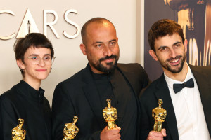 Hamdan Ballal (in the middle) in the Oscars photo room at the 97th Academy Awards in Hollywood, Los Angeles, California, U.S., March 2, 2025. REUTERS/Daniel Cole