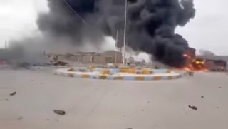 Flames and smoke rise from the site of an explosion in Al Bukamal, Deir al-Zor, Syria in this screengrab obtained from a social media video released on March 3, 2025. Social Media/via REUTERS