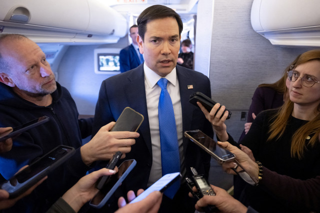 U.S. Secretary of State Marco Rubio speaks with the media on his military airplane as he flies to Jeddah, Saudi Arabia March 10, 2025. Photo: SAUL LOEB/Pool via REUTERS