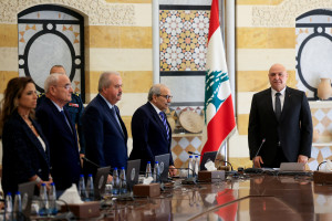 Lebanese President Joseph Aoun, Prime Minister Nawaf Salam and members of the cabinet stand as they attend a cabinet session to discuss the army's plan to disarm Hezbollah, at the Presidential Palace in Baabda, Lebanon, September 5, 2025. Photo:  Reuters by Mohamed Azakir
