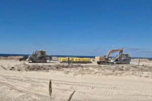 A screengrab from a handout video shows Israeli military vehicles moving barrier blocks to mark the "Yellow Line", in location given as Gaza, released on October 20, 2025. Photo: Israel's Ministry of Defence via Reuters Connect