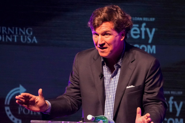 Former Fox News host Tucker Carlson speaks Tuesday, Oct. 21, 2025, during a Turning Point USA tour stop at the Indiana University Auditorium in Bloomington. Photo: Reuters Connect