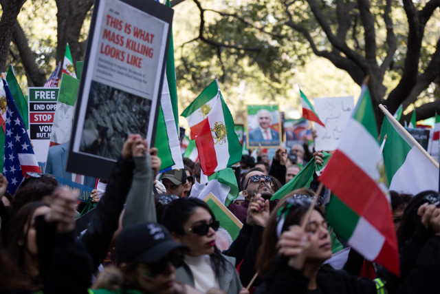 A moment of silence is held for the thousands recently killed in Iran during a protest calling for U.S. involvement against Iran's Islamic Republic regime in Houston, Texas, on January 18, 2026. (Photo by Reginald Mathalone/NurPhoto vua Reuters Connect)