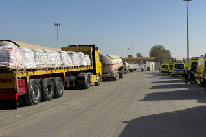 Trucks carrying aid line up next to Egyptian ambulances before transporting supplies into the Gaza Strip through the Rafah border crossing on the Egyptian side, following the first day of Israel reopening the border for pedestrian movement, in Rafah, Egypt, February 2, 2026. Photo: Reuters Connect