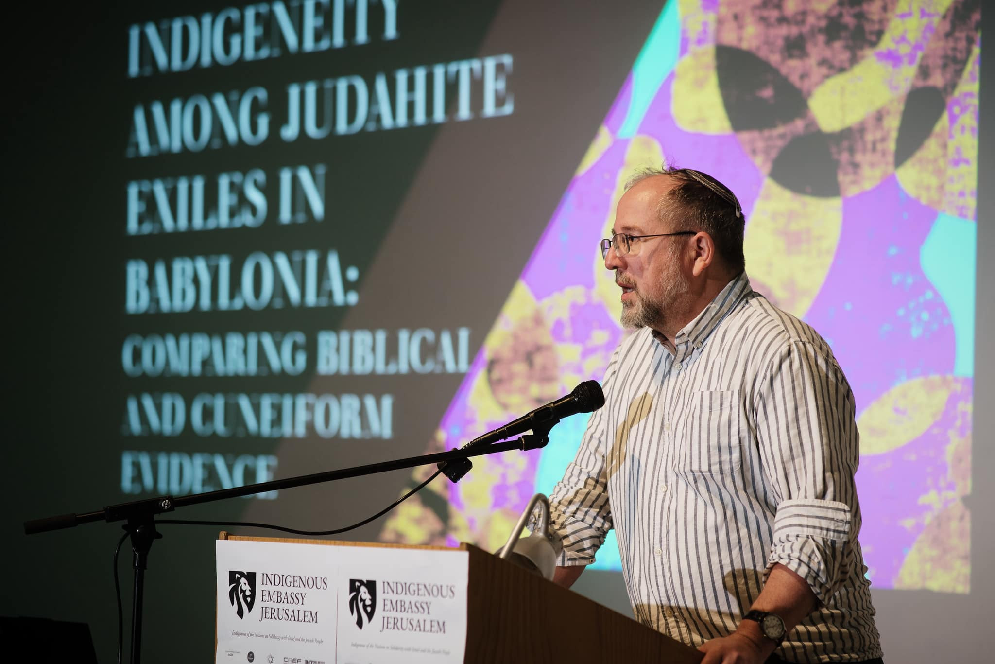 Assoc Prof Shawn Zelig Aster speaking at Indigenous Embassy Jerusalem Academic Symposium at the Bible Lands Museum. November 5 2025. Photo:  Indigenous Embassy in Jerusalem