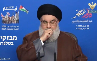 Hezbollah leader Hasan Nasrallah coughs during a speech, May 25, 2021 (Photo: Twitter screenshot)