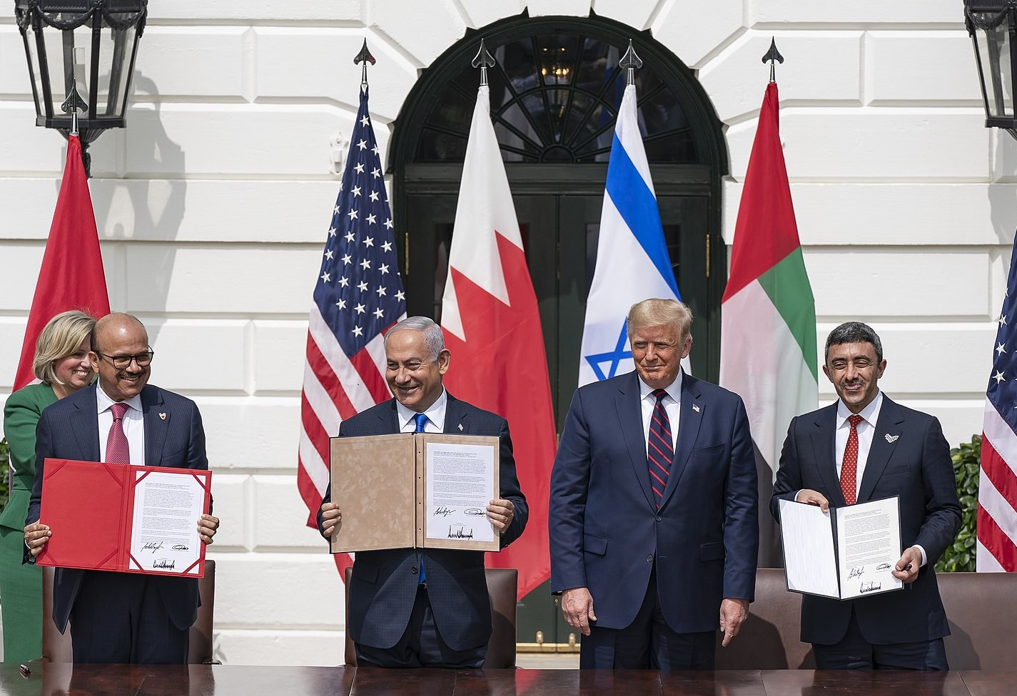 President Donald J. Trump, Minister of Foreign Affairs of Bahrain Dr. Abdullatif bin Rashid Al-Zayani, Israeli Prime Minister Benjamin Netanyahu and Minister of Foreign Affairs for the United Arab Emirates Abdullah bin Zayed Al Nahyanisigns sign the Abraham Accords Tuesday, Sept. 15, 2020, on the South Lawn of the White House. (Official White House Photo by Shealah Craighead)