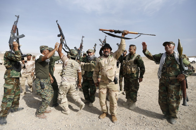 Illustrative - Shi'ite militia fighters in al-Fatha, northeast of Baiji, Iraq, October 18, 2015. (Photo: REUTERS/Thaier Al-Sudani)
