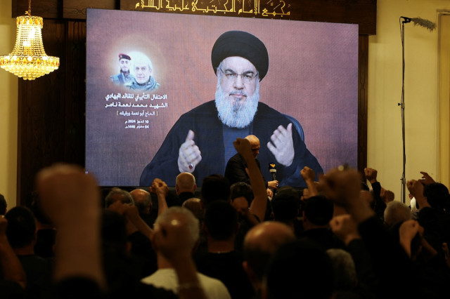 Lebanon's Hezbollah leader Hassan Nasrallah gestures during a televised address at a memorial service for Muhammed Nasr, Hezbollah's senior commander who was killed on June 3 in an Israeli strike in south Lebanon, in Beirut's southern suburbs, Lebanon, July 10, 2024. (Photo: REUTERS/Mohamed Azakir)