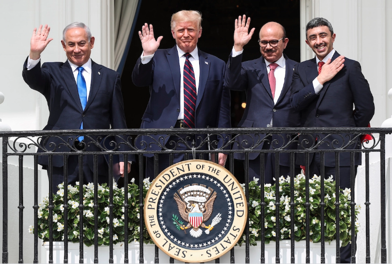 Israel's Prime Minister Benjamin Netanyahu, U.S. President Donald Trump, Bahrain's Foreign Minister Abdullatif Al Zayani and United Arab Emirates (UAE) Foreign Minister Abdullah bin Zayed wave from the White House balcony after a signing ceremony for the Abraham Accords, on the South Lawn of the White House in Washington, U.S., Sept. 15, 2020. REUTERS/Tom Brenner