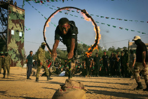 Palestinian youth demonstrate their skills during a graduation ceremony of a military-style camp organized by Hamas in Khan Younis in the southern Gaza Strip, Aug. 18, 2017. (Photo: Abed Rahim Khatib/Flash90)