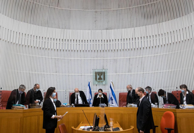 Illustrative - Israeli Supreme Court President Esther Hayut and Supreme Court justices arrive to petitions against the Jewish Nation-State Law, at the Supreme Court in Jerusalem on December 22, 2020. (Photo: Yonatan Sindel/Flash90)