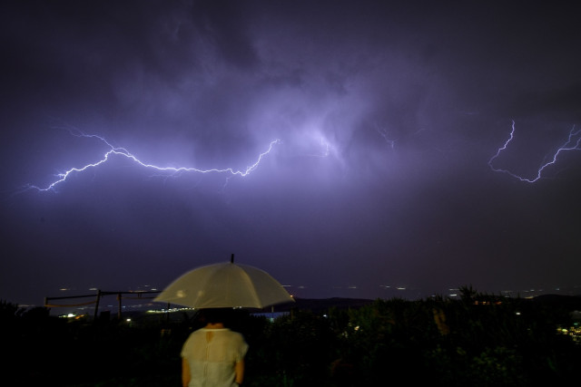 Lightning illuminates the sky over the over the Naftali Mountains and the Hula Valley, during a storm on June 3, 2023. Photo by Ayal Margolin/Flash90