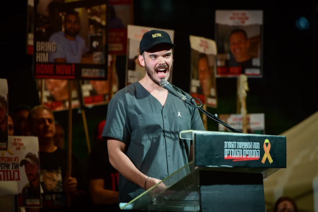 Andrey Kozlov, who was held hostage by Hamas terrorists in Gaza and was rescued by Israeli army last month, speaks at a rally calling for the release of Israelis held hostage by Hamas terrorists in Gaza, at "Hostage Square" in Tel Aviv, July 13, 2024. (Photo: Avshalom Sassoni/Flash90)