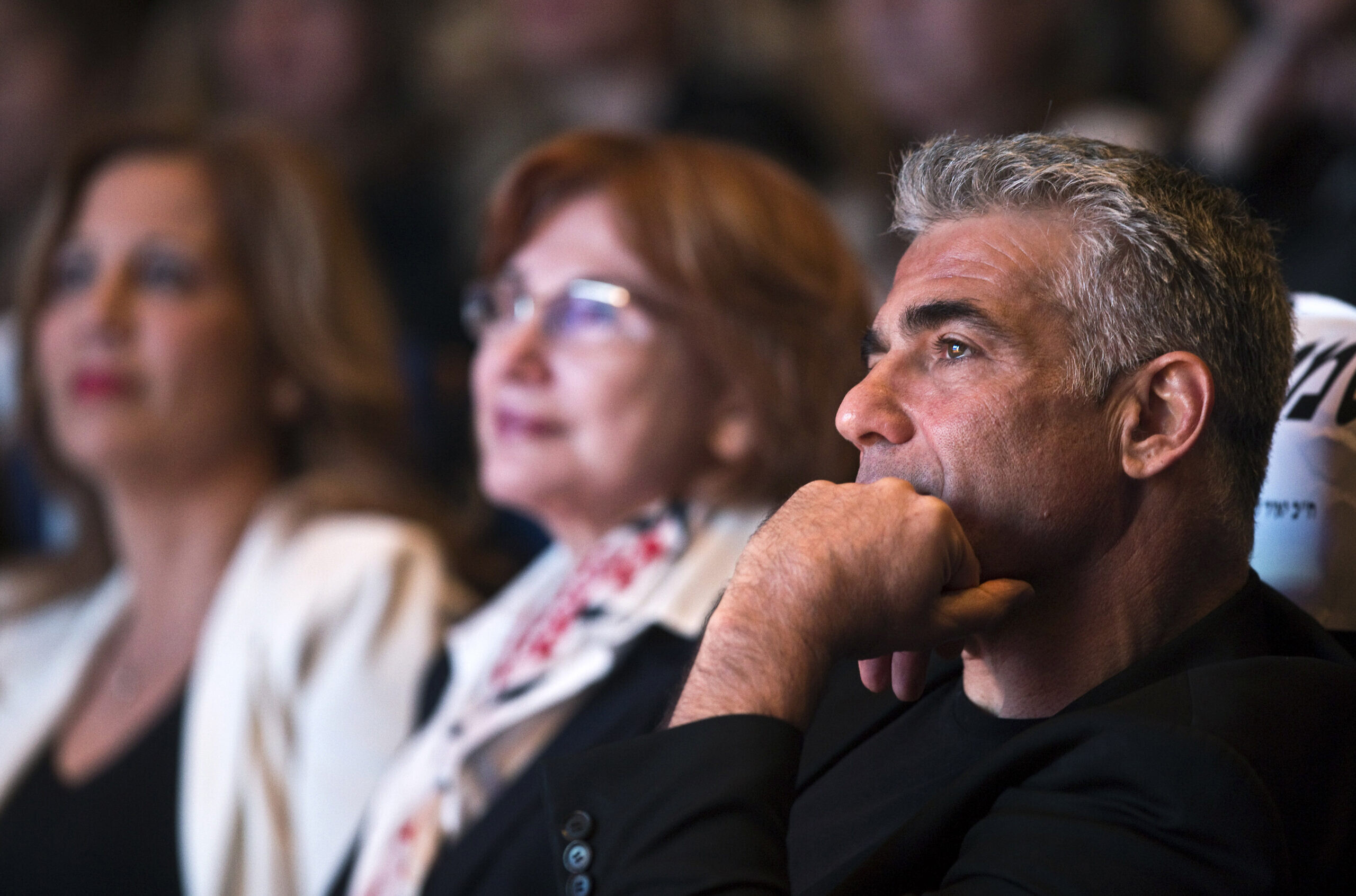 Yair Lapid, head of the Yesh Atid party, attends a women's committee convention in Tel Aviv. (Photo credit: REUTERS/Nir Elias)
