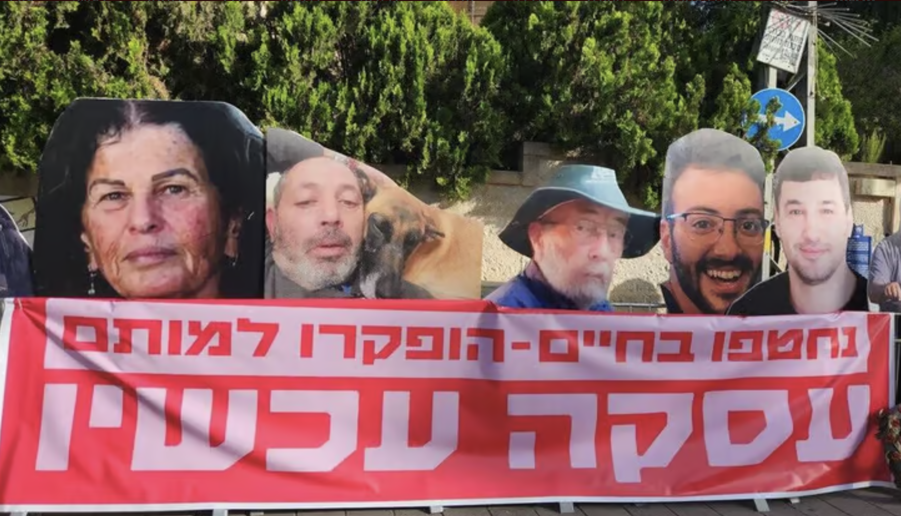 Demonstrators hold a sign that reads "Kidnapped alive - abandoned to their death. A deal now" (Photo: Women's Protest for the Hostages)