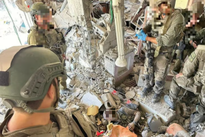 The body of Sinwar surrounded by IDF solders (Social media - used by section 27A of the copyright law)