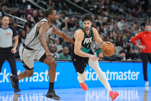 Jan 3, 2026; San Antonio, Texas, USA; Portland Trail Blazers forward Deni Avdija (8) dribbles past San Antonio Spurs forward Harrison Barnes (40) in the second half at Frost Bank Center. Mandatory Credit: Daniel Dunn-Imagn Images