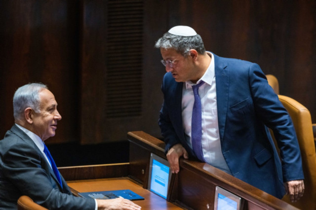 Likud leader MK Benjamin Netanyahu with Head of the Otzma Yehudit party MK Itamar Ben Gvir at a vote in the assembly hall of the Knesset, the Israeli parliament in Jerusalem, on December 28, 2022 (Photo: Olivier Fitoussi/Flash90).