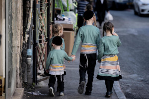 Ultra orthodox Jewish children walk in the ultra orthodox Jewish neighborhood of Meah Shearim, Jerusalem, on September 28, 2023. Photo by Chaim Goldberg/Flash90