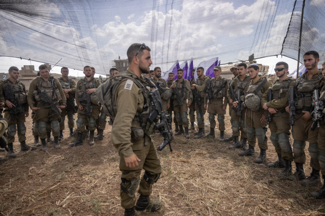 Israeli soldiers at a staging area not far from the Israeli-Gaza border. Photo by Chaim Goldberg/Flash90