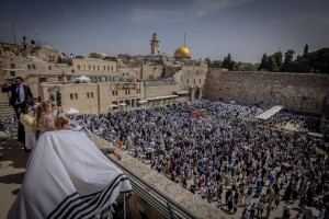 Jewish worshippers attend the Cohen Benediction priestly blessing at the Western Wall in Jerusalem's Old City, during the Jewish holiday of Passover, April 25, 2024. Photo by Chaim Goldberg/Flash90