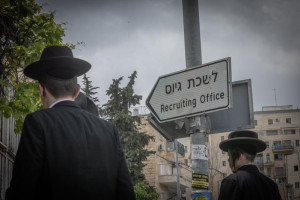 Ultra orthodox jewish men protest against the drafting of Ultra orthodox jews to the Israeli army outside the army recrutiment office in Jerusalem, May 1, 2024. Photo by Chaim Goldberg/Flash90