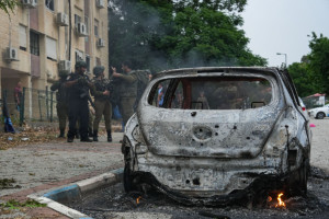 Israeli security forces at the scene where a rocket fired from Lebanon into Northern Israel hit the northern Israeli city of Kiryat Shmona, May 10, 2024 (Photo: Ayal Margolin/Flash90).