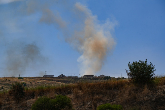View of a large fire caused from rockets fired from Lebanon, outside Kibbutz Malkia, on the Israeli border with Lebanon, May 26, 2024 (Photo: Ayal Margolin/Flash90).