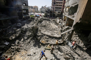 Palestinians amid destruction in Nuseirat camp in the central Gaza Strip, on June 8, 2024. Photo by Khaled Ali/Flash90