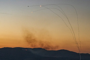 An anti-missile system fires interception missiles as rockets fired from Lebanon, as it seen from the northern Israeli town of Kiryat Shmona, July 16, 2024 (Photo: Ayal Margolin/Flash90).