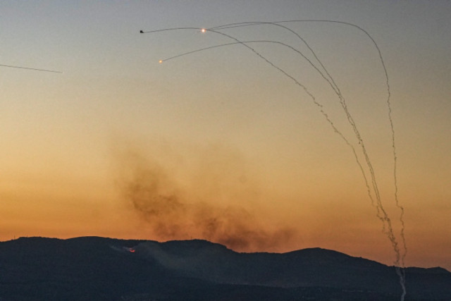 An anti-missile system fires interception missiles as rockets fired from Lebanon, as it seen from the northern Israeli town of Kiryat Shmona, July 16, 2024 (Photo: Ayal Margolin/Flash90).