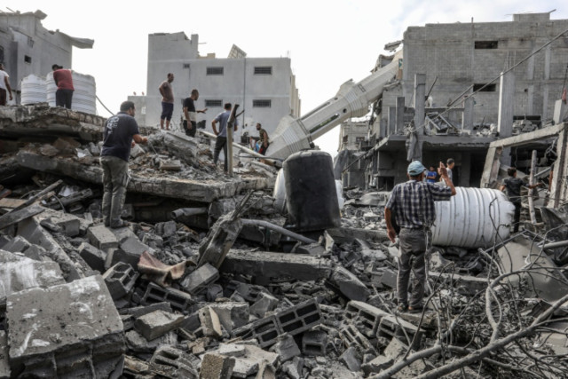 Palestinians inspect the Abdullah Azzam Mosque after an Israeli air strike, in the Nuseirat camp in the central Gaza Strip, on July 17, 2024 (Photo: Abed Rahim Khatib/Flash90).