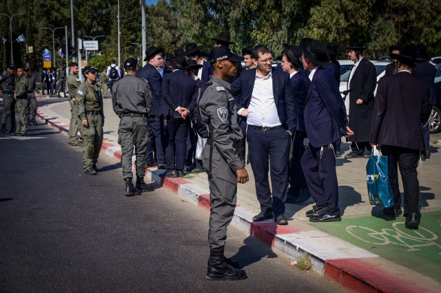 Ultra orthodox Jews clash with police during a protest against the drafting of ultra orthodox jews to the Israeli army, outside the IDF Recruitment Center at Tel Hashomer, in central Israel, October 31, 2024. Photo by Avshalom Sassoni/Flash90