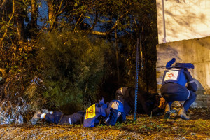 People take cover as siren warns of incoming missile fired from Yemen, near Rehovot, December 30, 2024. Photo by Yossi Aloni/Flash90
